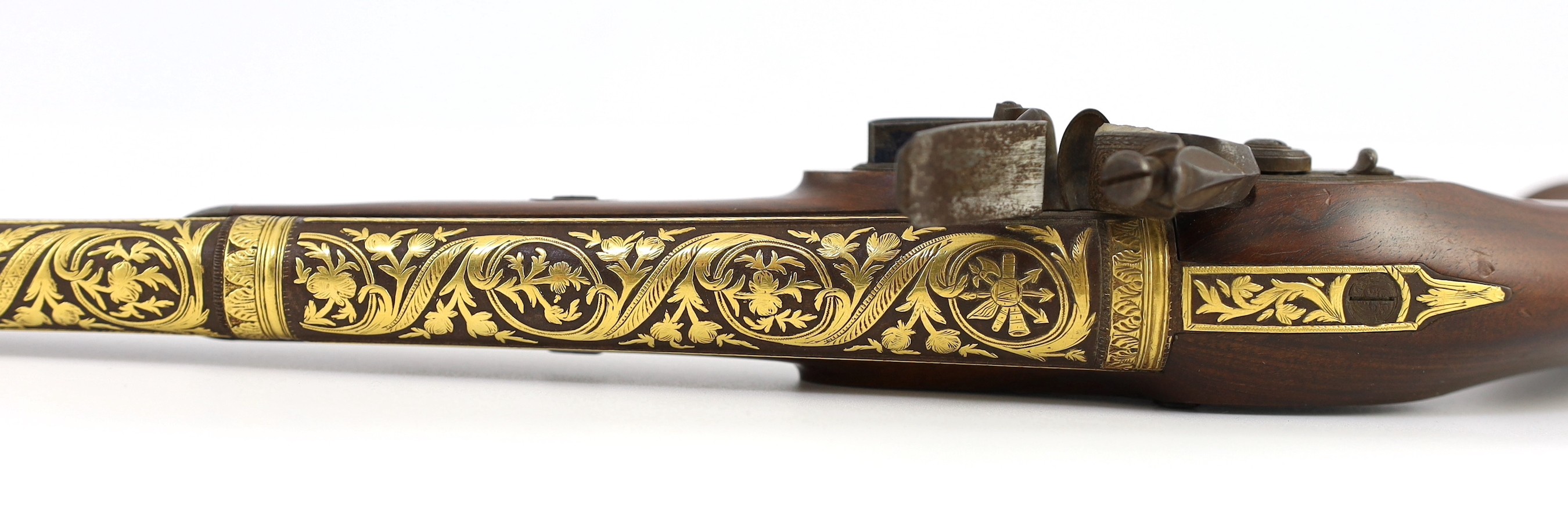 An early 19th century gold overlaid flintlock pistol, by Beckwith, London, 47cm